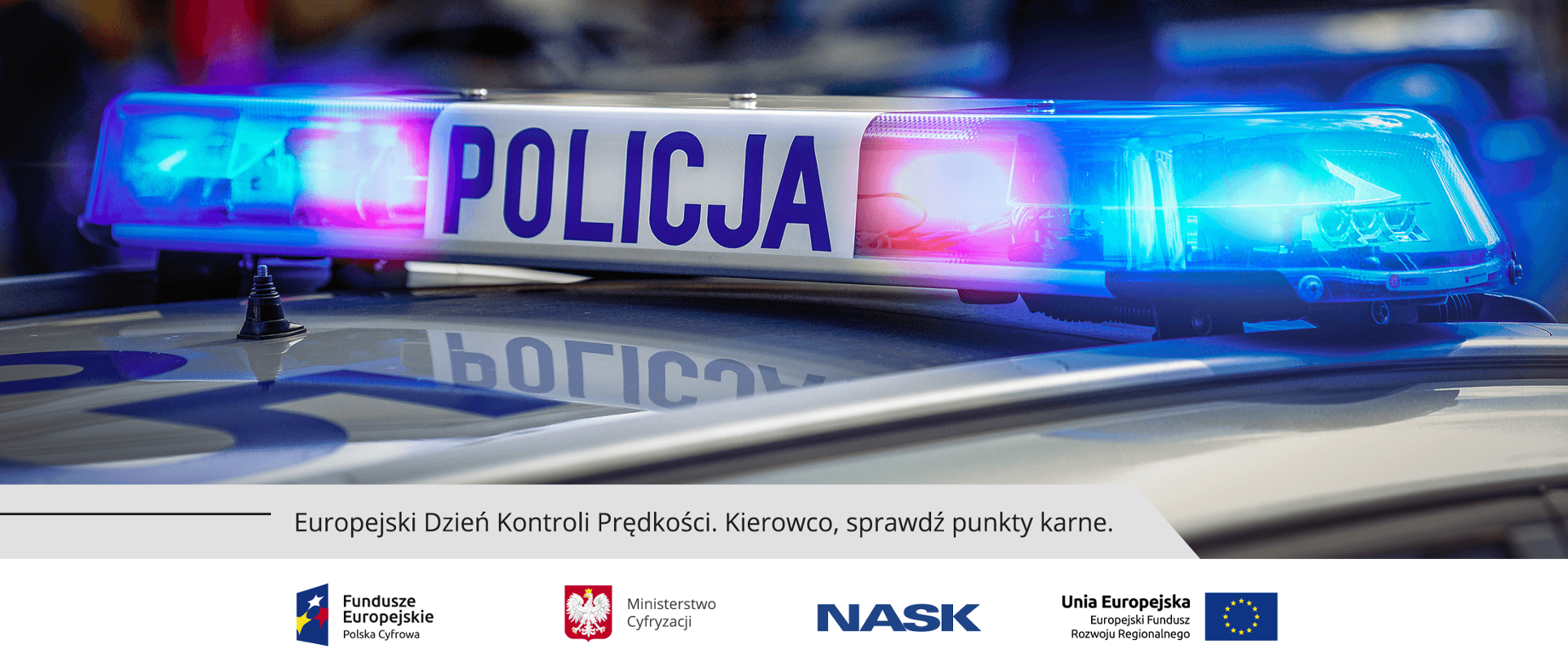 Sygnalizator świetlny na dachu policyjnego samochodu