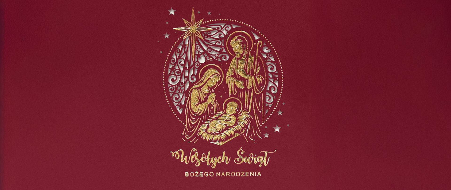 Bordowa kartka świąteczna ze złoconymi elementami. W centralnej części, wewnątrz ozdobnego okręgu, znajduje się grafika przedstawiająca Świętą Rodzinę w stajence. Powyżej widnieje Betlejemska Gwiazda, a poniżej ozdobny napis: „Wesołych Świąt Bożego Narodzenia”.