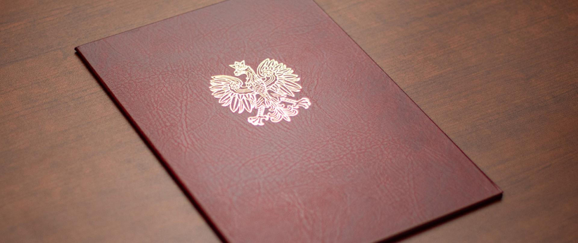 Elegant file cover with crowned eagle.