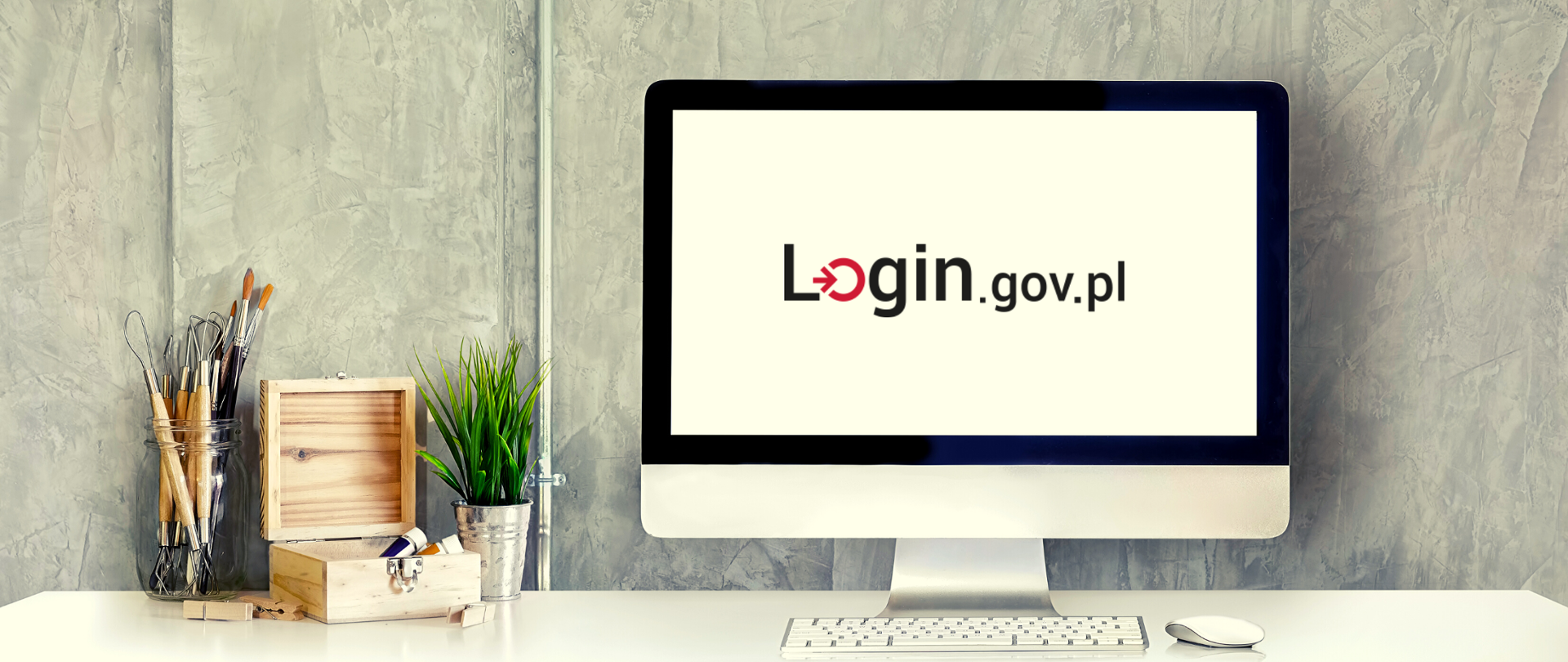 Monitor z logiem Login.gov.pl na ekranie