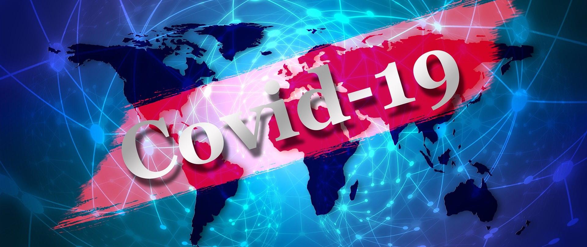 Napis Covid-19 na tle mapy świata