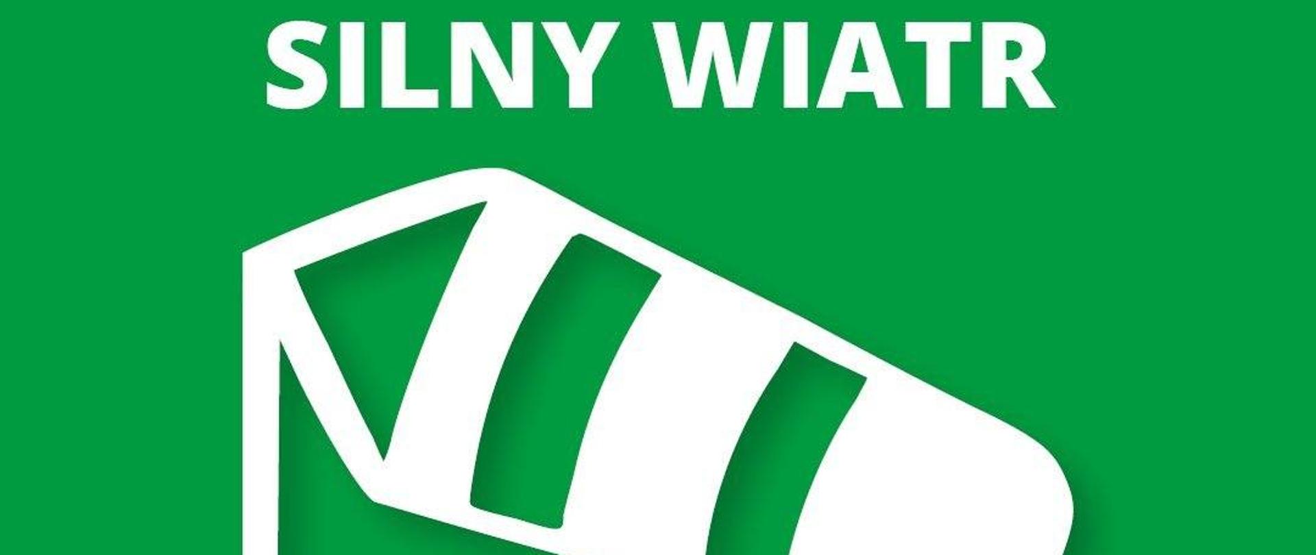 Na zielonym tle biały napis "Silne Wiatry" oraz grafika wiatrowskazu.