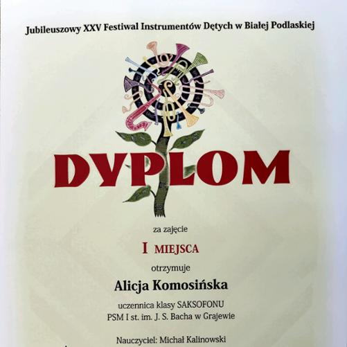 Dyplom za zajęcie I miejsca przyznany Alicji Komosińskiej podczas Jubileuszowego XXV Festiwalu Instrumentów Dętych w Białej Podlaskiej. 
