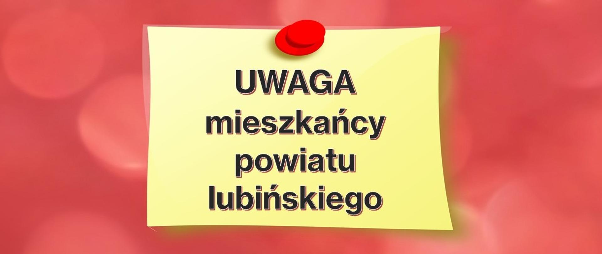 Żółta karteczka z napisem "UWAGA mieszkańcy powiatu lubińskiego"
