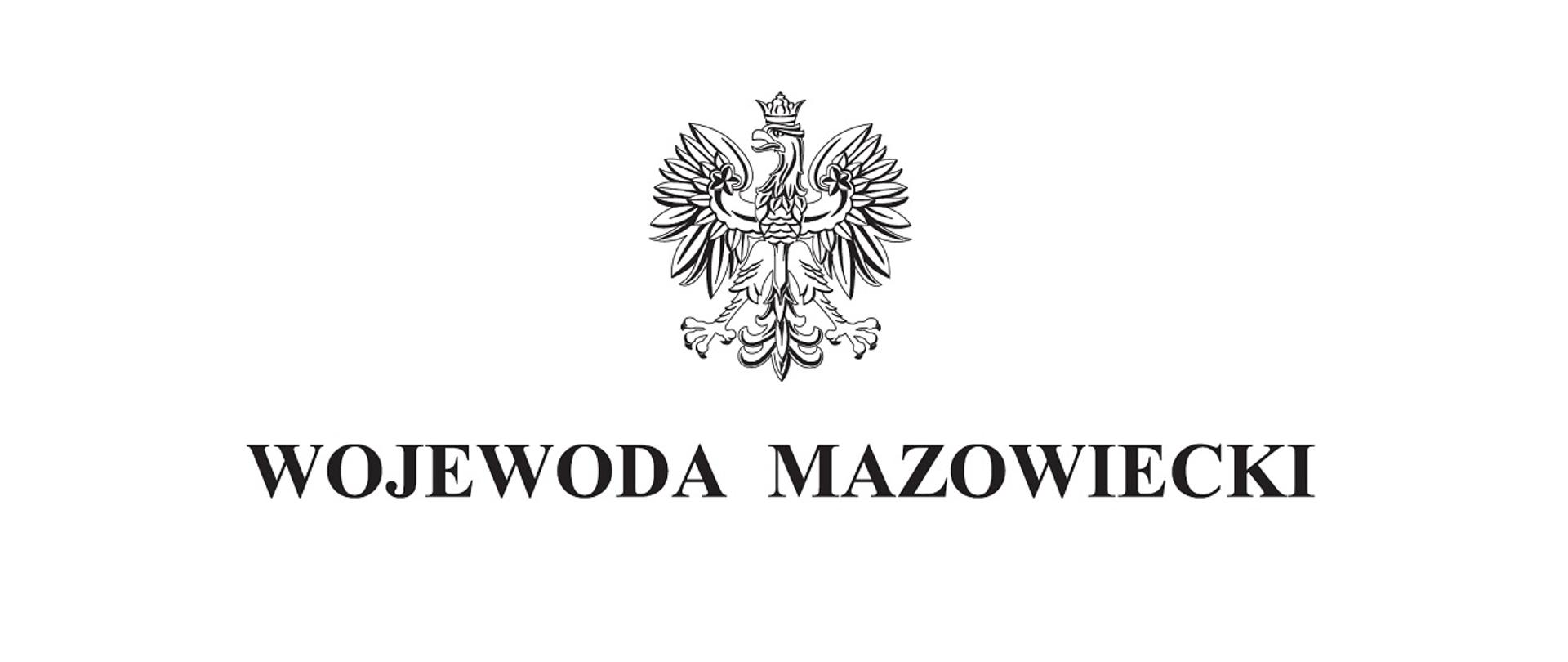 Zdjęcie przedstawia orła białego w koronie. Pod spodem znajduje się napis Wojewoda Mazowiecki.