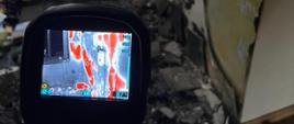 Kamera termowizyjna dokonująca pomiaru ściany