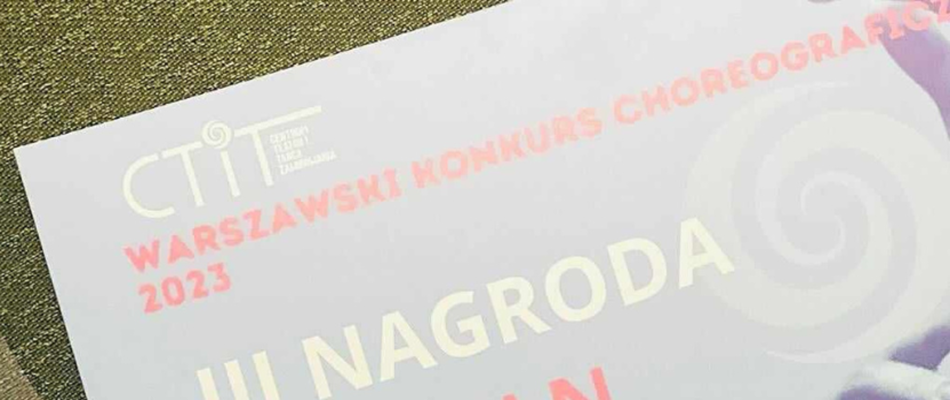zdjęcie: dyplom za zajęcie III miejsca w Warszawskim Konkursie Choreograficznym 2023. U góry dyplomu logo Centrum Teatru i Tańca Zawirowania