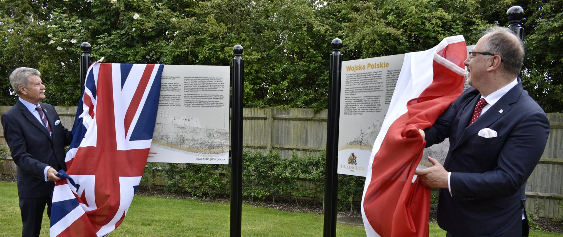 Hillingdon Councillor Sir Ray Puddifoot and Polish Ambassador Arkady Rzegocki unveil Polish Army interpretation boards at the remembrance garden near the Polish Air Force Memorial