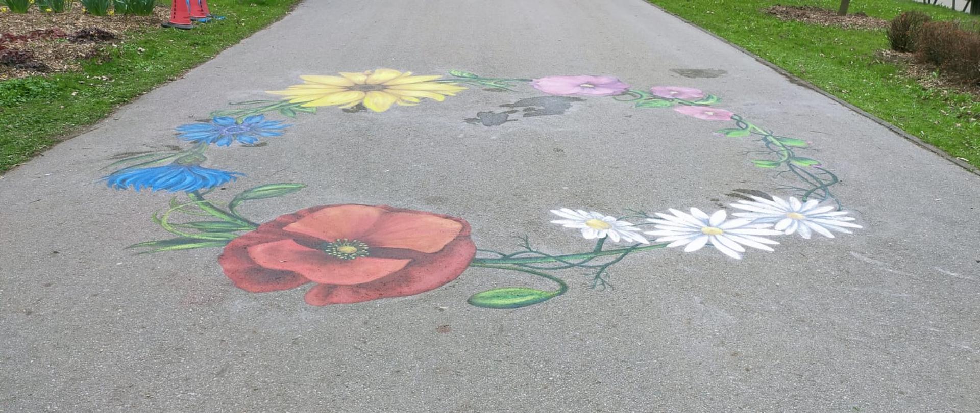 Polne kwiaty namalowane na chodniku