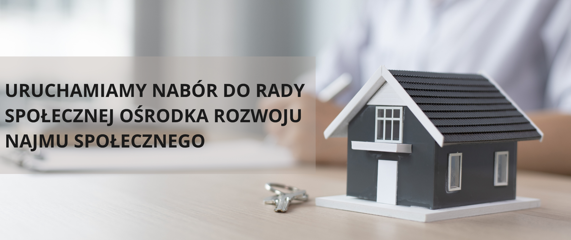 Zdjęcie modelu domu. Napis obok: uruchamiamy nabór do rady społecznej ośrodka rozwoju najmu społecznego 