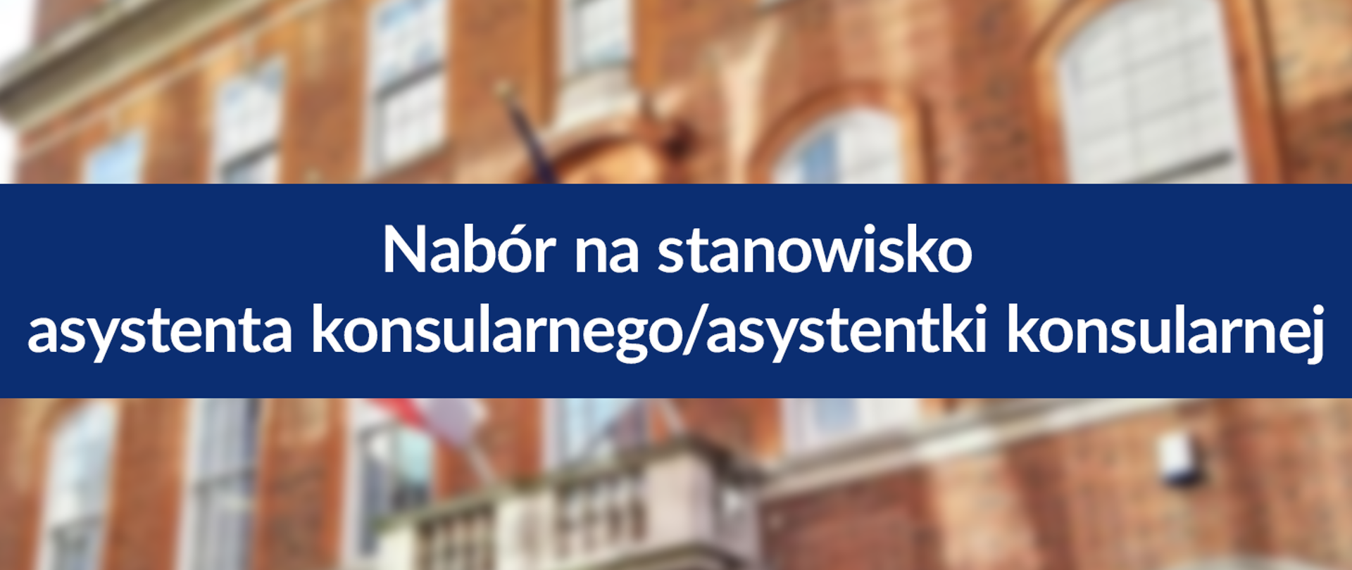Baner z napisem z budynkiem WKiP w Londynie w tle. 