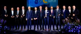 Minister Klimatu Michał Kurtyka z laureatami konkursu Global e-Mobility Leader