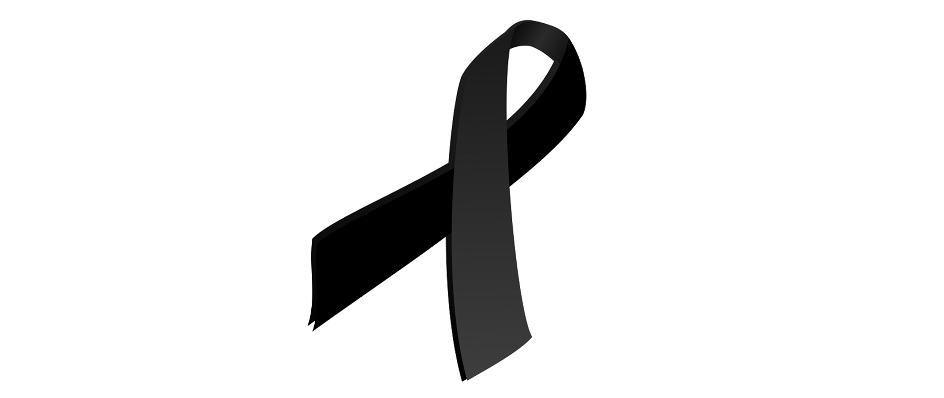 Zdjęcie przedstawia czarną wstążkę, symbol oznaczający żałobę.