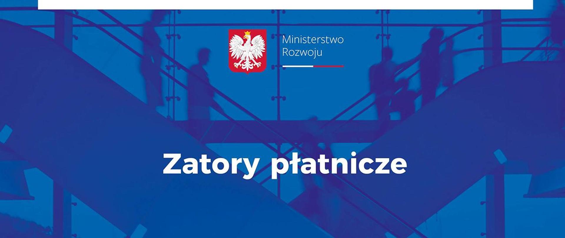 grafika przedstawia napis zatory płatnicze na tle zdjęcia krzyżujących się ruchomych schodów; zdjęcie jest niebieskie, po środku na górze jest logo MR 