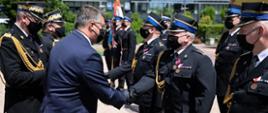 Odznaczenia i awanse dla przasnyskich strażaków na Mazowieckich obchodach Dnia Strażaka
