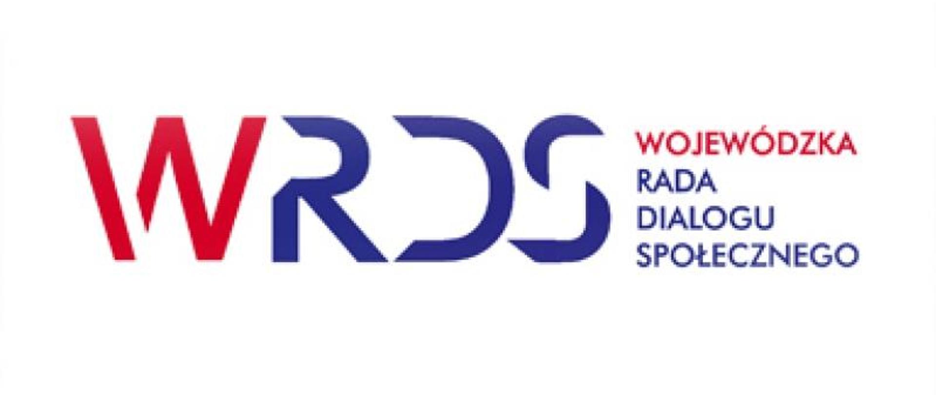biała tablica na niej napis WRDS Wojewódzka Rada Dialogu Społecznego