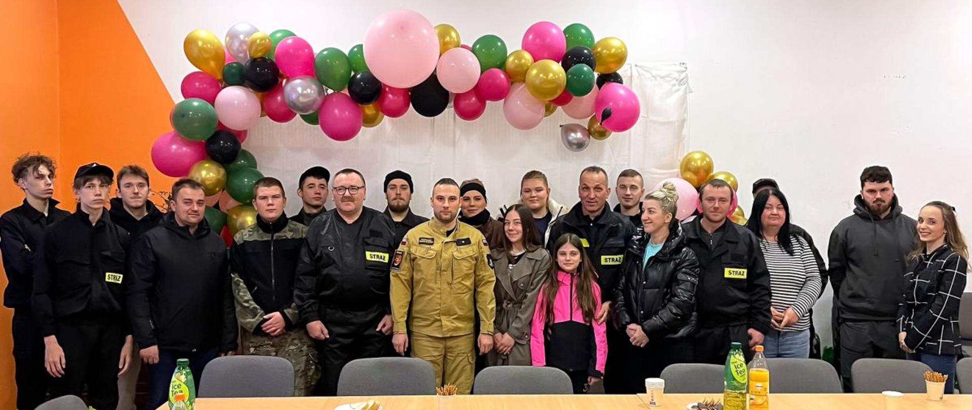 Zdjęcie przedstawia wszystkich zgromadzonych na zebraniu sprawozdawczym w jednostce OSP Jureczkowa. 