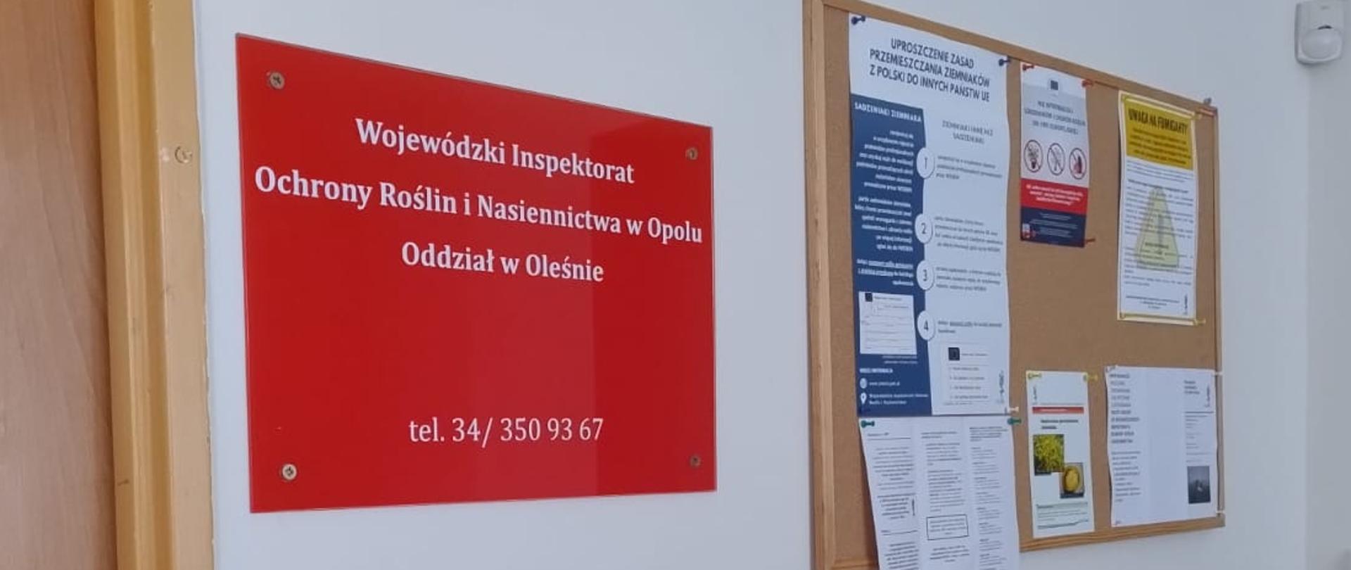 Zdjęcie przedstawia tabliczkę informacyjną
