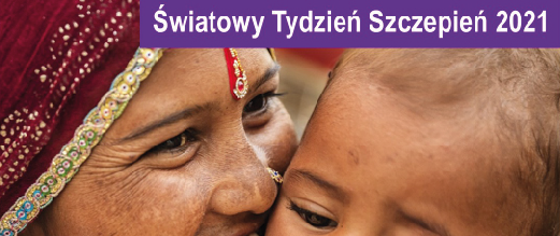 Obrazek przedstawiający starszą kobietę trzymającą dziecko z hasłem szczepimy się