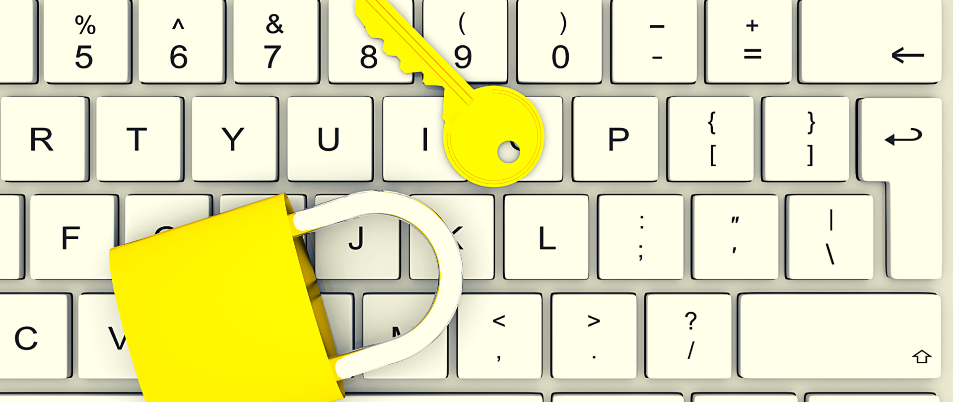 Biała klawiatura komputerowa, na której leżą żółta kłódka i żółty klucz