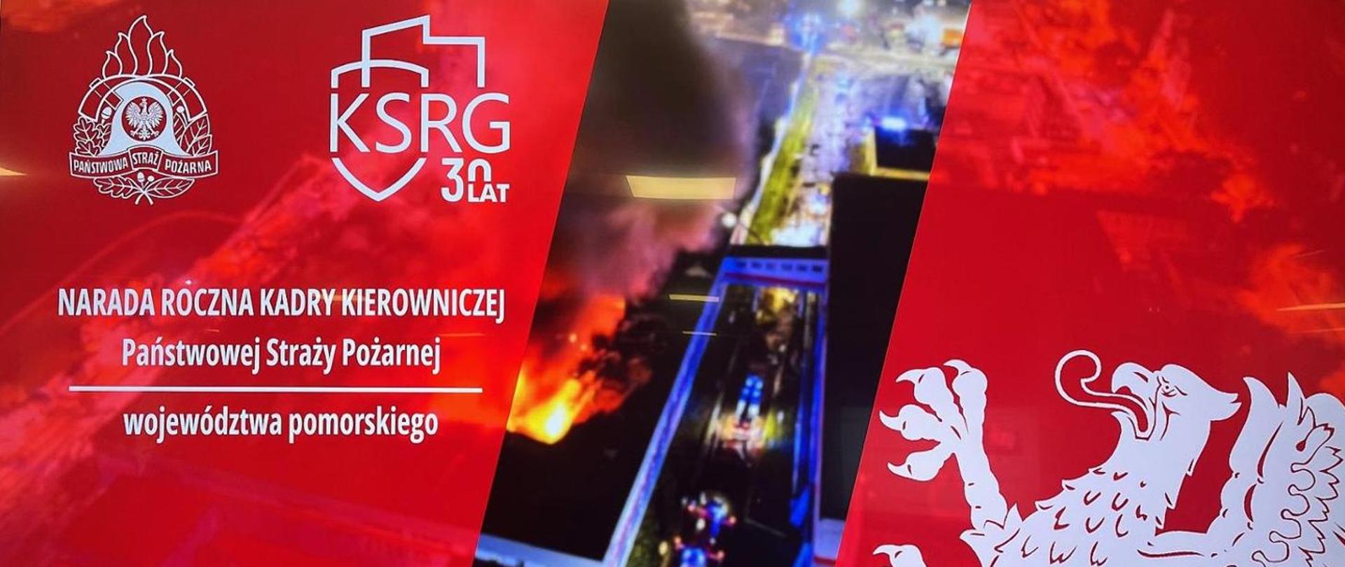 Baner z napisem: narada roczna kadry kierowniczej PSP województwa pomorskiego. W tle widać pożar hali.
