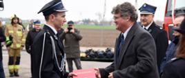 Uroczyste przekazanie ciężkich samochodów ratowniczo - gaśniczych dla jednostek OSP w powiecie płońskim