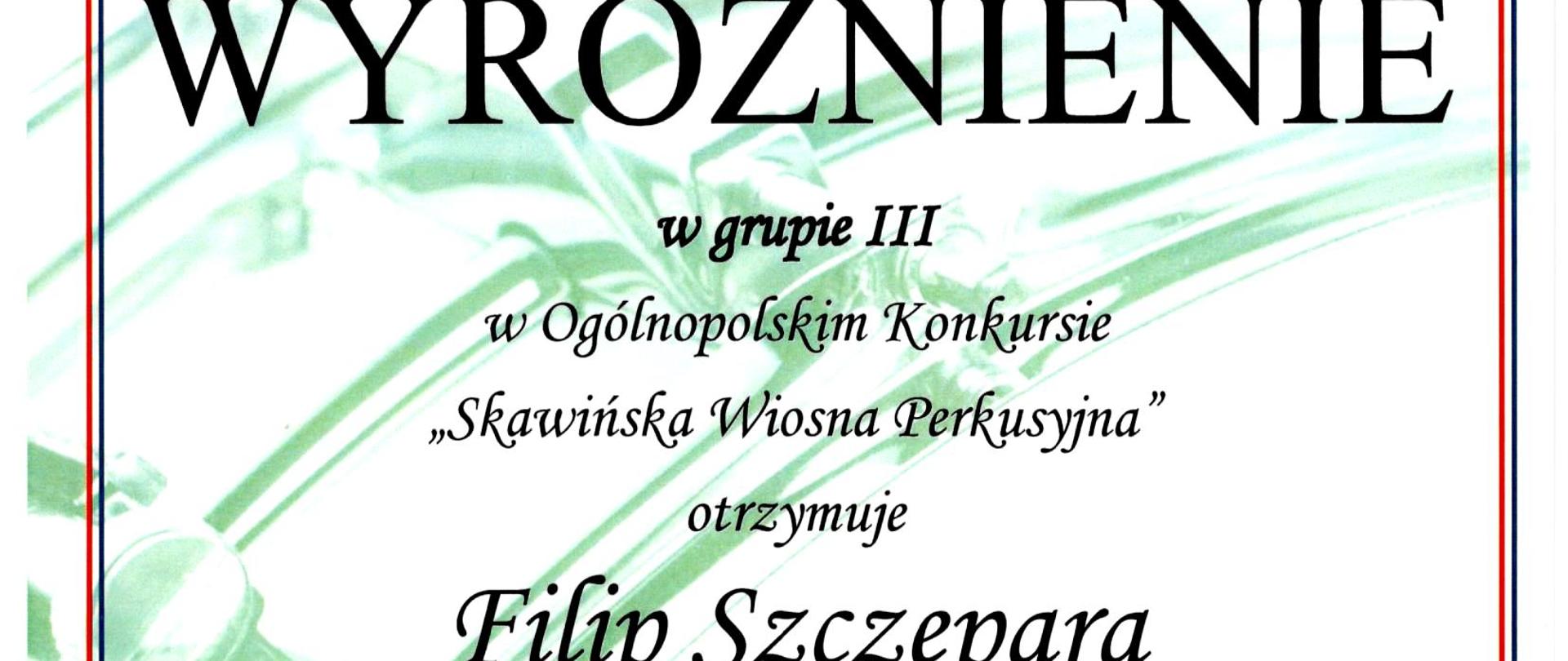 białe tło z zielonym zarysem werbla