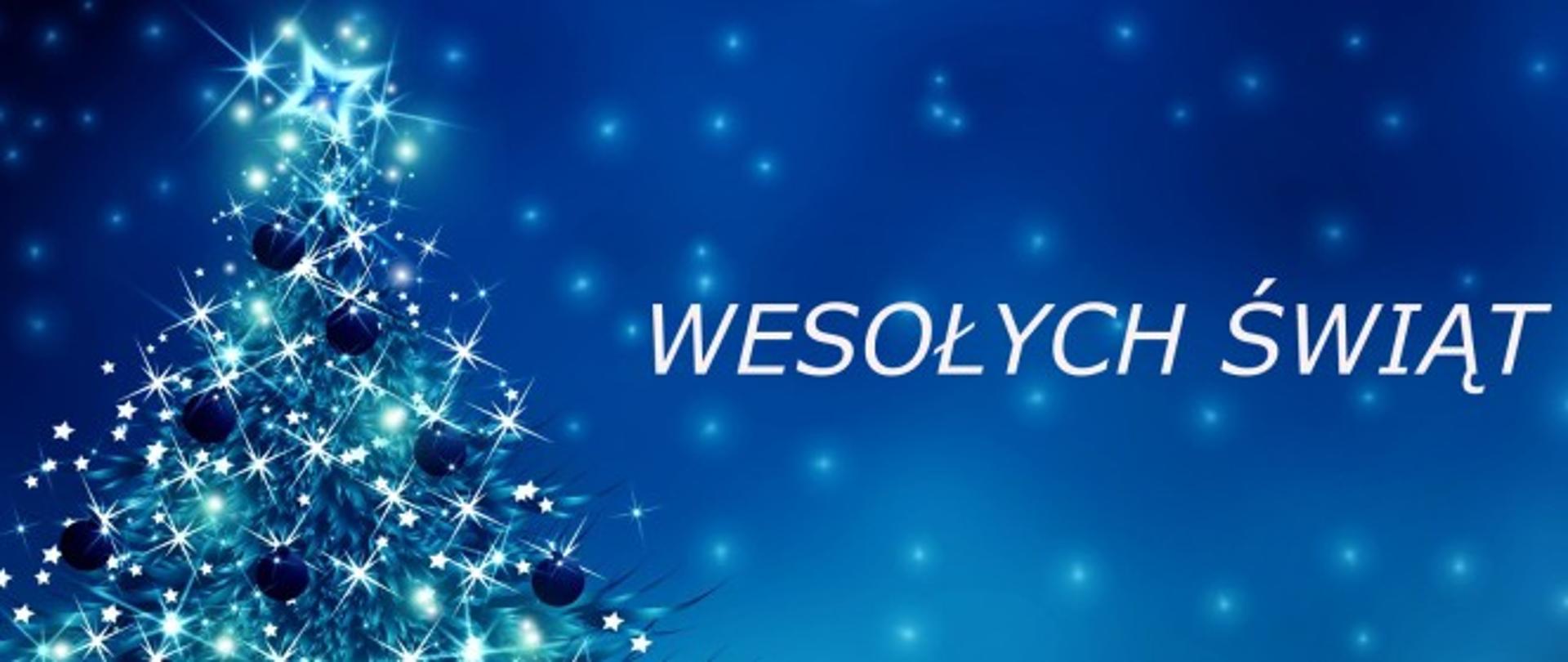 Kartka świąteczna, na niebieskim tle choinka i napis Wesołych Świąt 