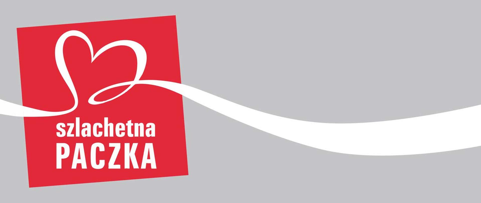 Napis szlachetna paczka, serce utworzone z białej wstęgi na czerwonym tle