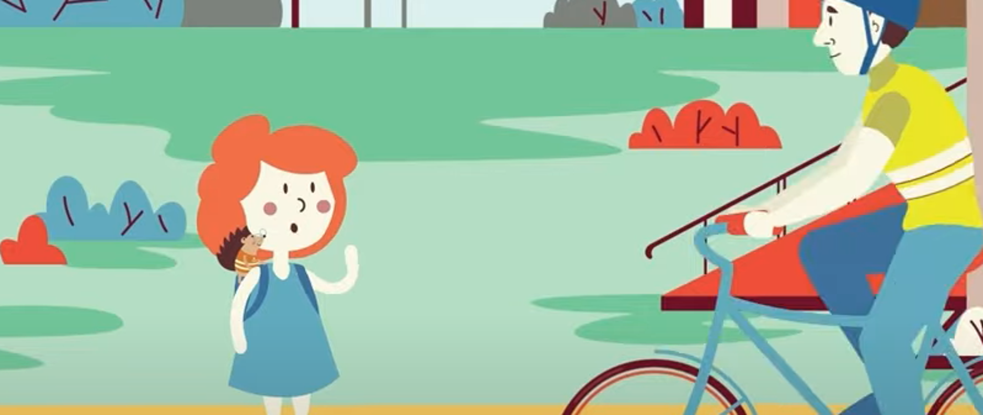 Scena z filmu propagującego bezpieczeństwo ruchu drogowego, dziecko przed przejściem dla pieszych i rowerzysta