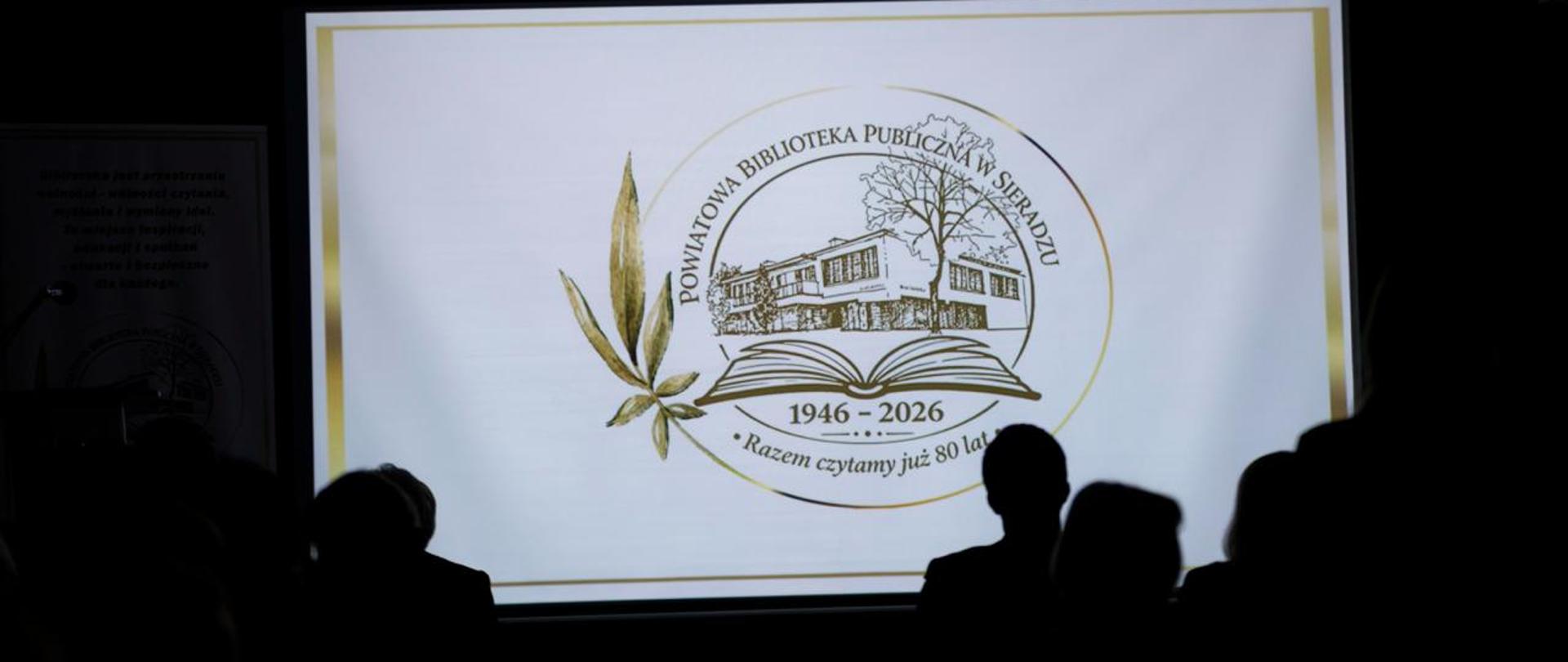 Powiatowa Biblioteka Publiczna w Sieradzu - logo. 