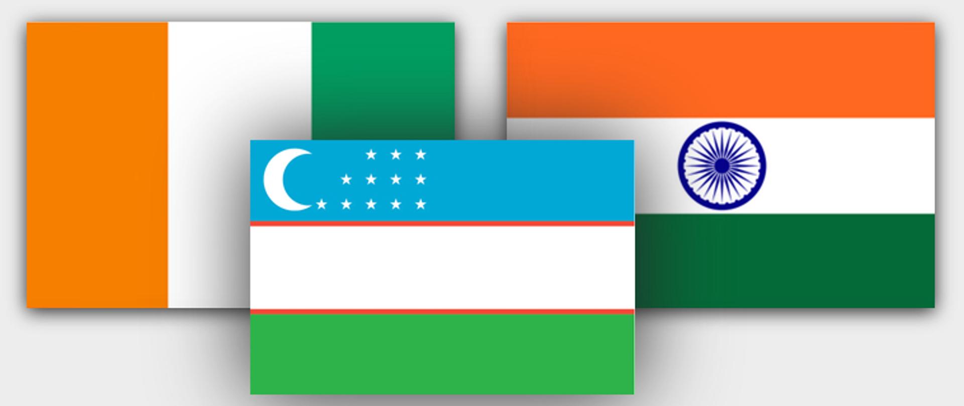 Na zdjęciu widoczne są ułożone koło siebie flagi trzech krajów: Indii, Wybrzeża Kości Słoniowej i Uzbekistanu