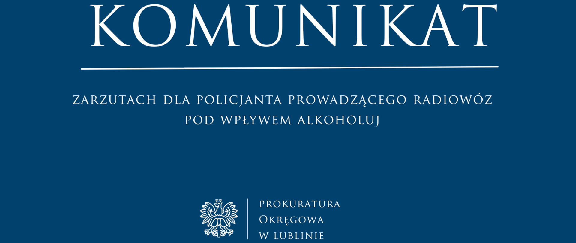 Niebieski baner o treści: Komunikat o zarzutach dla policjanta prowadzącego radiowóz pod wpływem alkoholu