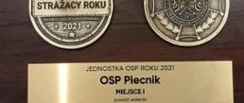 Zdjęcie przedstawia okolicznościowy grawer "Jednostka OSP roku 2021 OSP Piecnik" miejsce I powiat wałecki