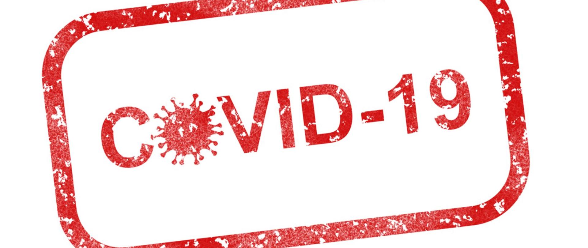 pieczątka czerwona na białym tle z napisem Covid-19 