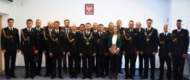 Zdjęcie grupowe studentów podyplomowych Akademii Pożarniczej.
