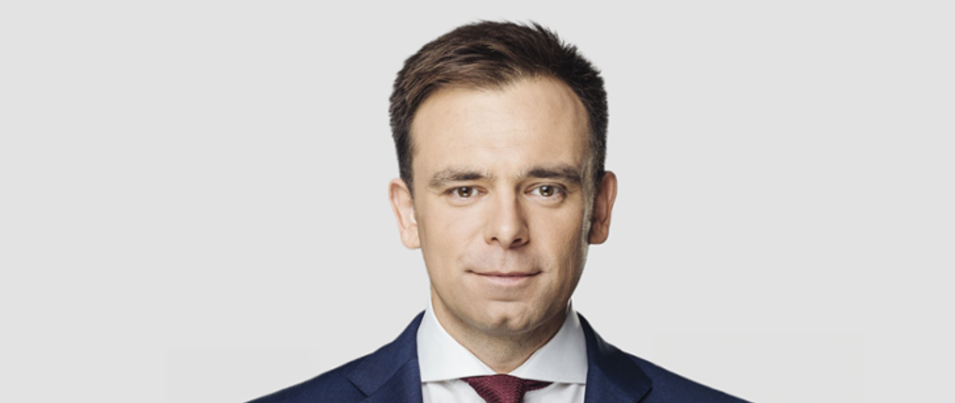 Uśmiechnięty minister finansów Andrzej Domański