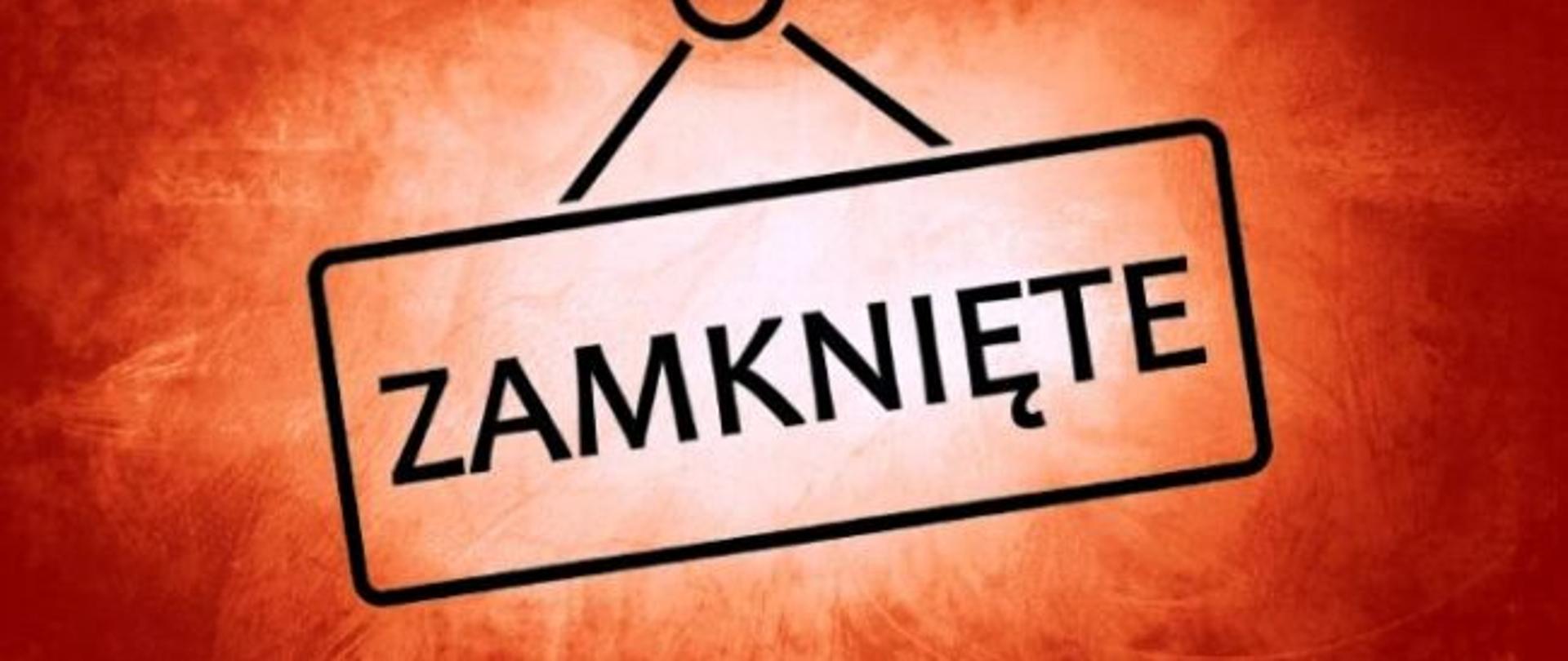 Napis zamknięte na pomarańczowym tle
