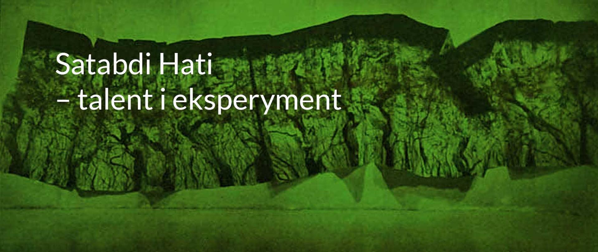 Biały napis na zielonym tle