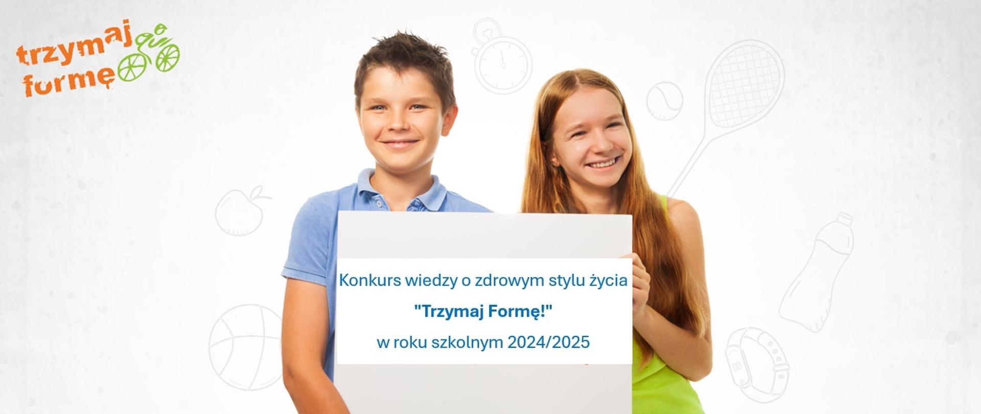Dziewczynka i chłopiec trzymają w dłoniach transparent z informacją o konkursie wiedzy o zdrowym stylu życia "Trzymaj formę"