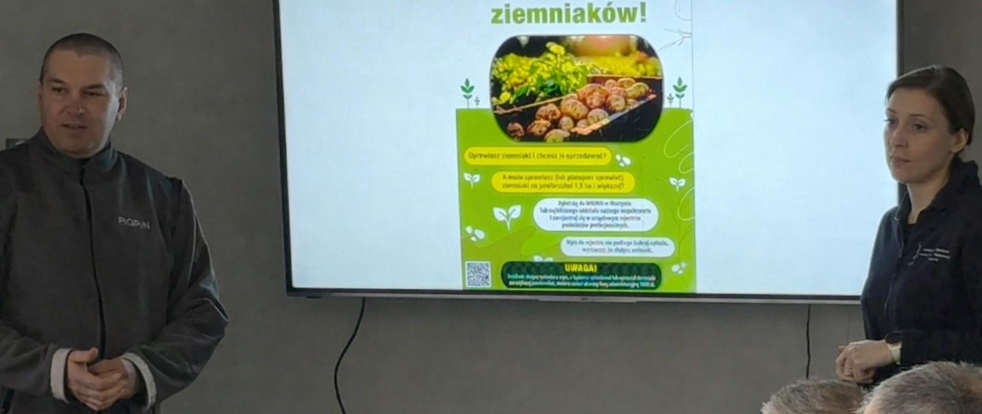 Prelegenci prowadzą prezentację dotyczącą zasad rejestracji upraw ziemniaków przed grupą słuchaczy w sali konferencyjnej