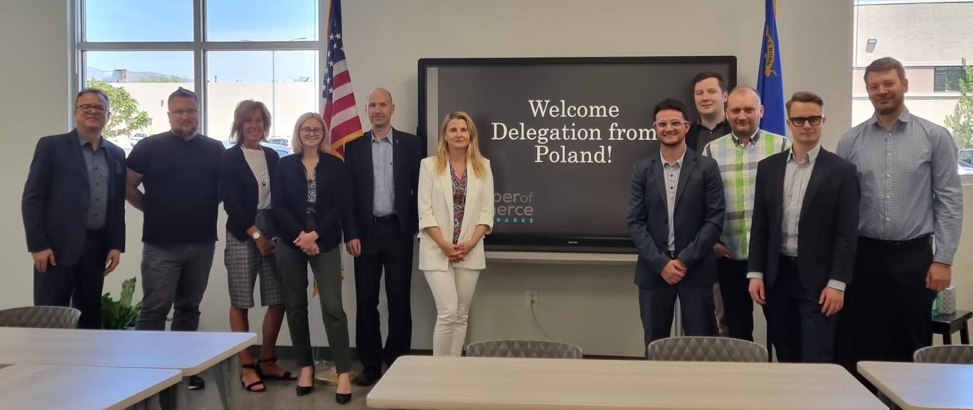A group of smartly dressed people posing for a photo
