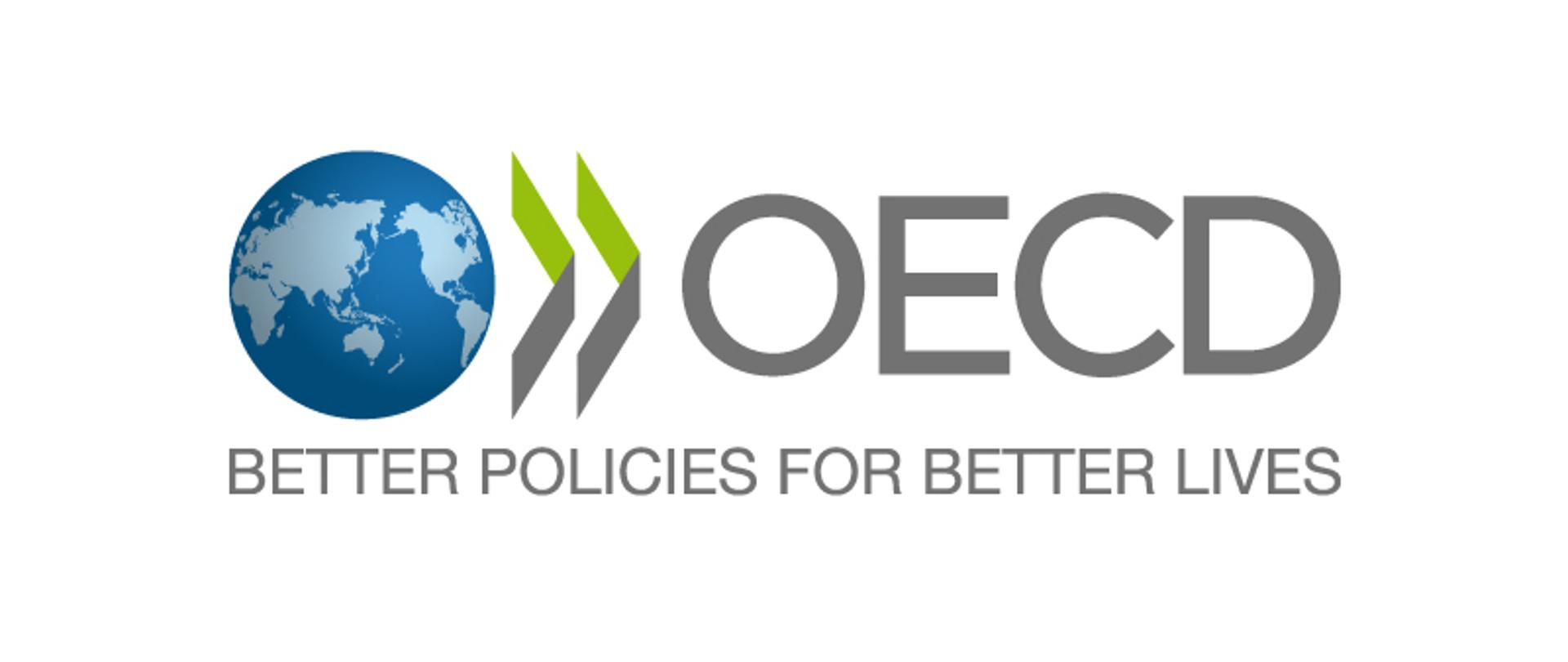 kula ziemska ze strzałkami i napisem OECD Better policies for better lives