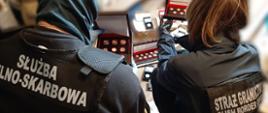 Funkcjonariusze Służby Celno-Skarbowej i Straży Granicznej.
