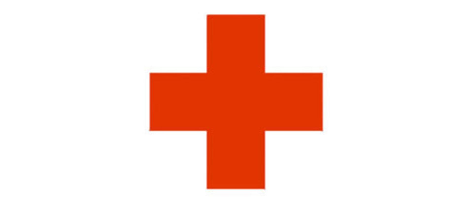 Na zdjęciu znak krzyża w kolorze czerwonym na białym tle