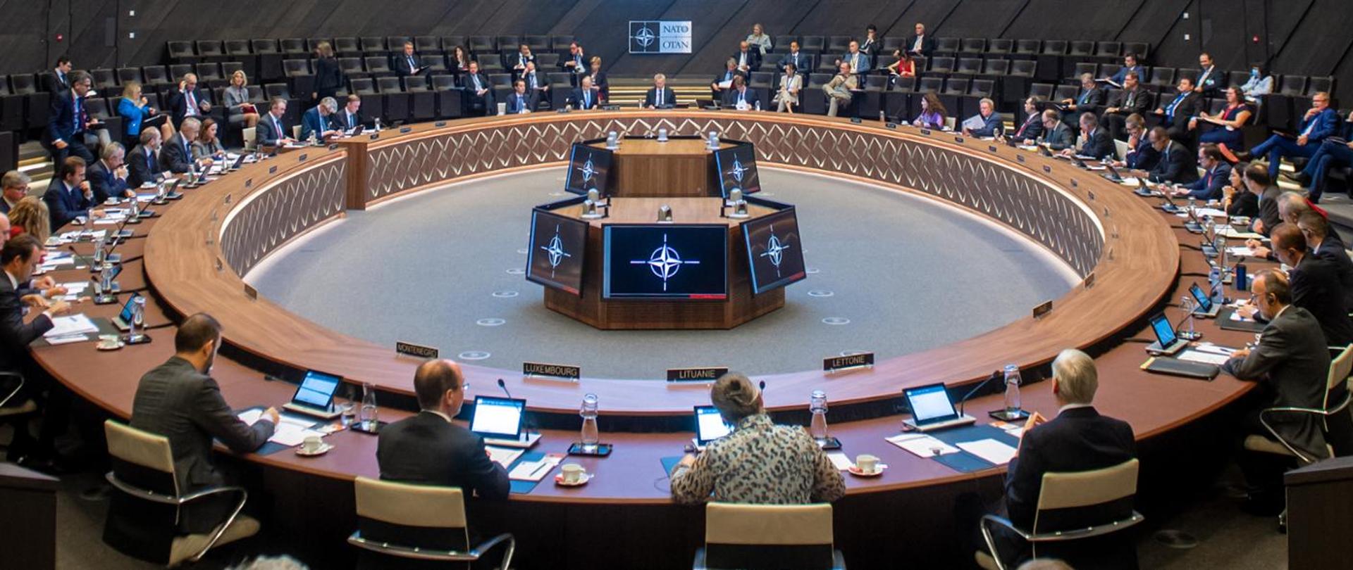 Participants of the meeting sitting at the table