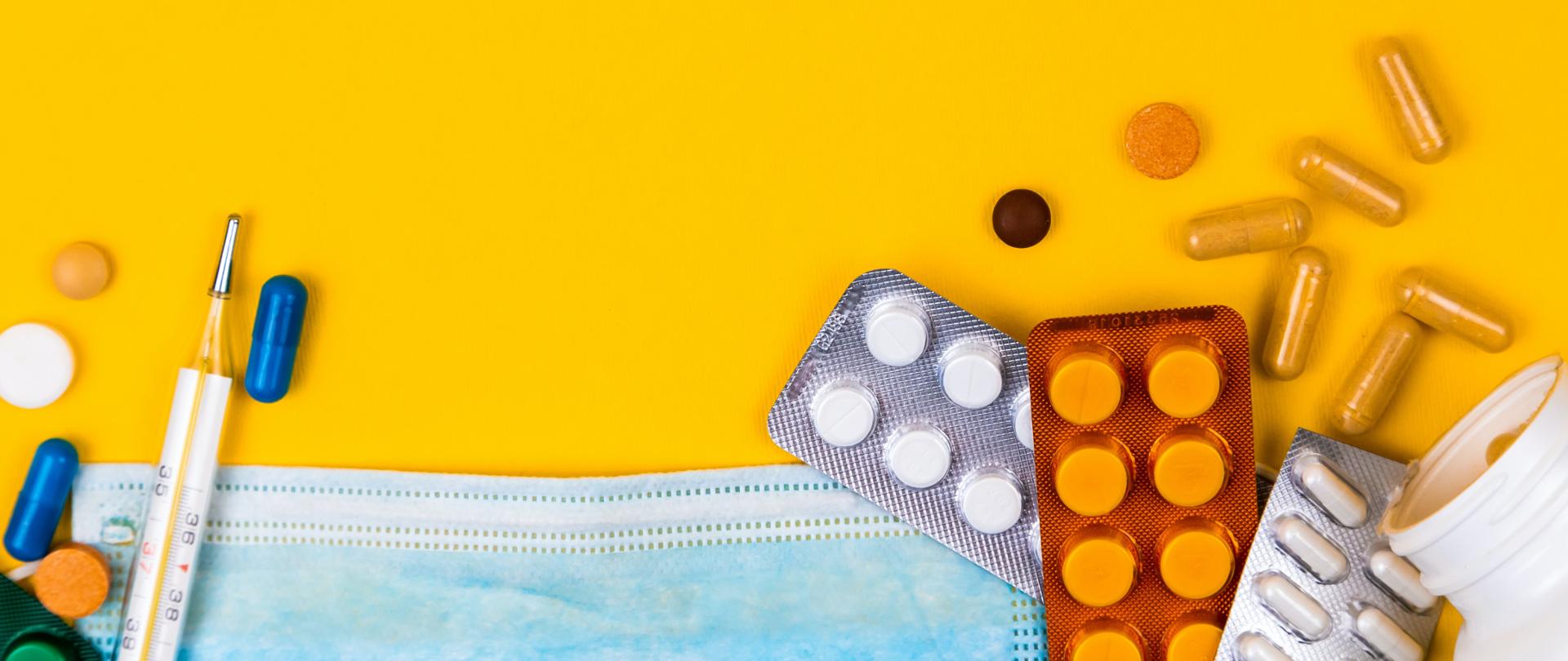 tabletki maseczka i termometr