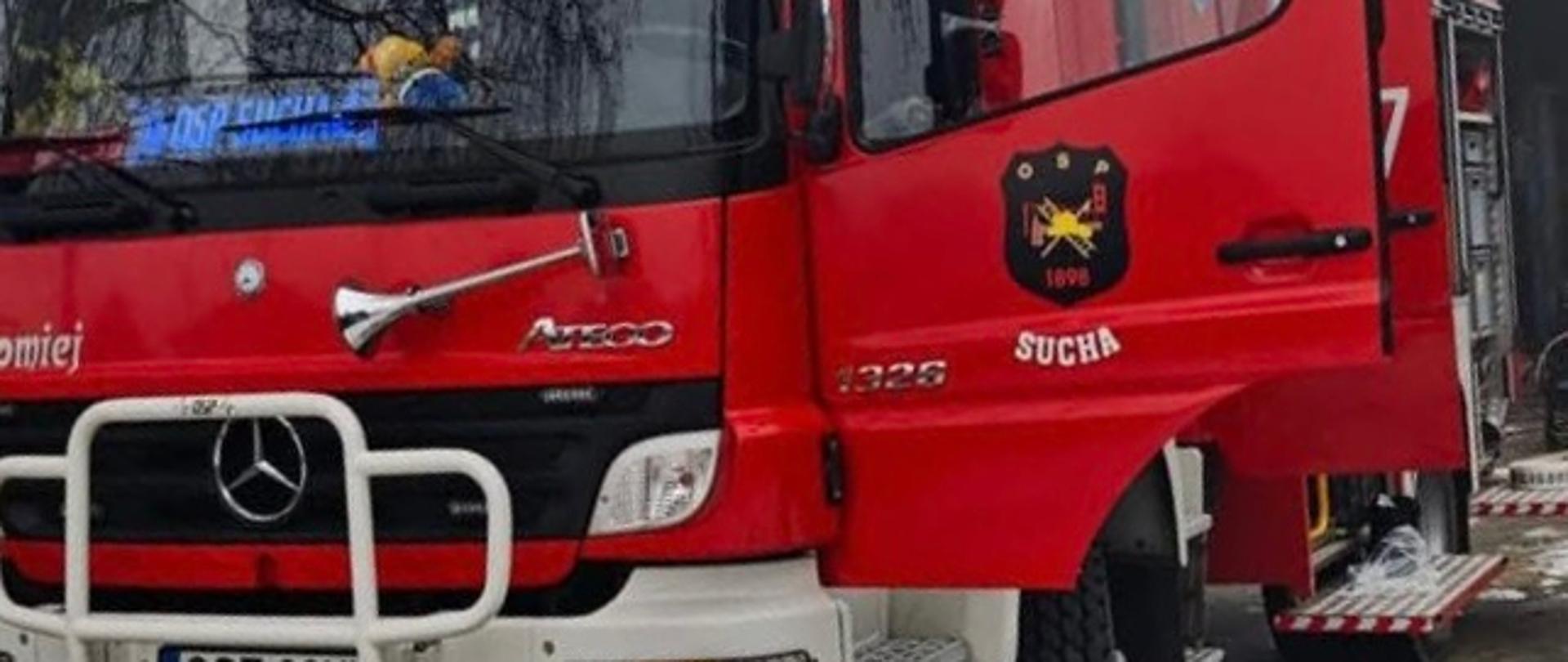 Na zdjęciu znajduje się samochód strażacki