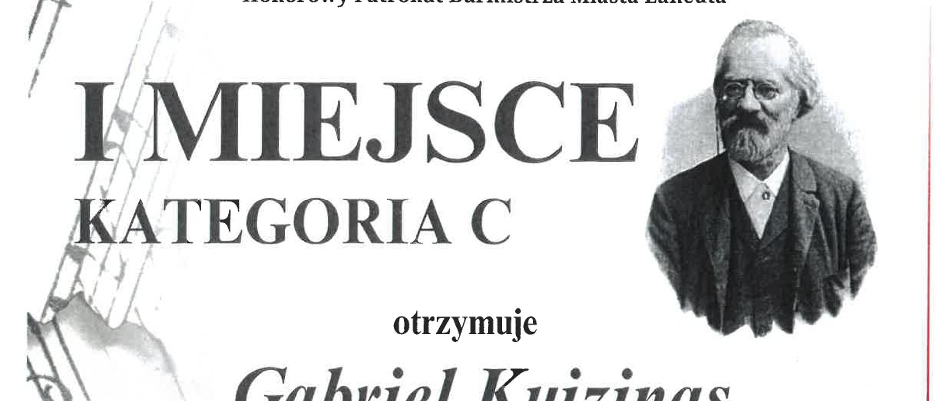 Dyplom z czerwonym napisem po środku III Ogólnopolski Konkurs Pianistyczny im. T.Leszetyckiego w Łańcucie. Z [prawej strony popiersie kompozytora, w tle symbole muzyczne - nuty, klucze muzyczne. Na dole drukowane nazwiska jurorów i ich odręczne podpisy. Z prawej strony godło miasta Łańcut.
