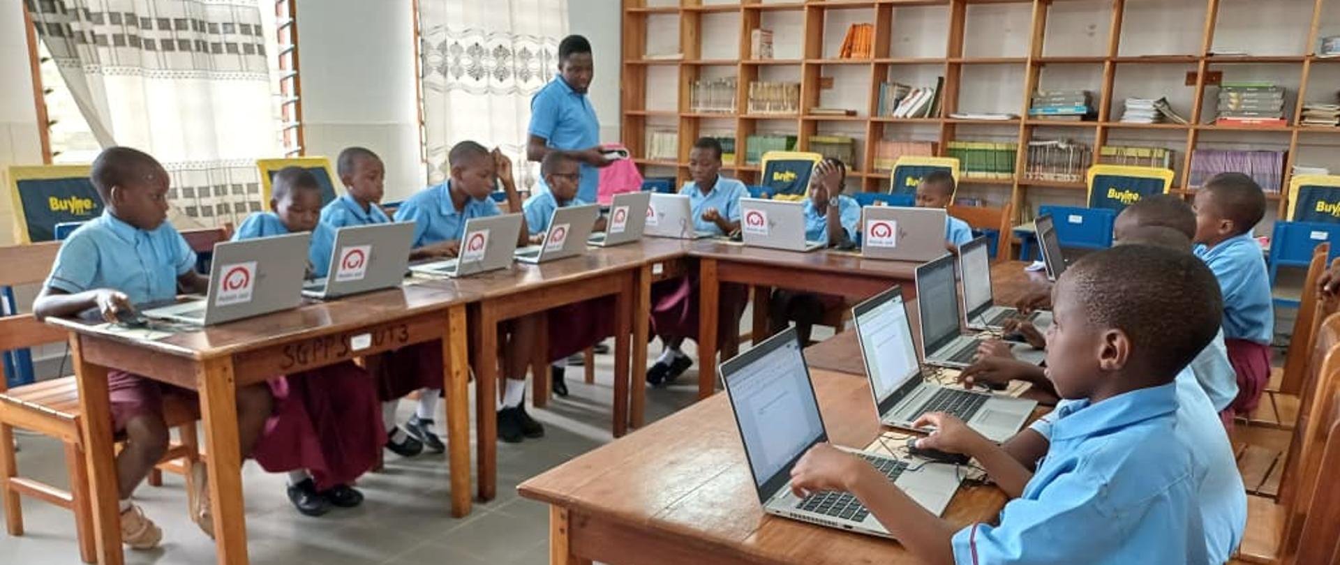 Children working on new laptops in St. Getrude Pre & Primary school